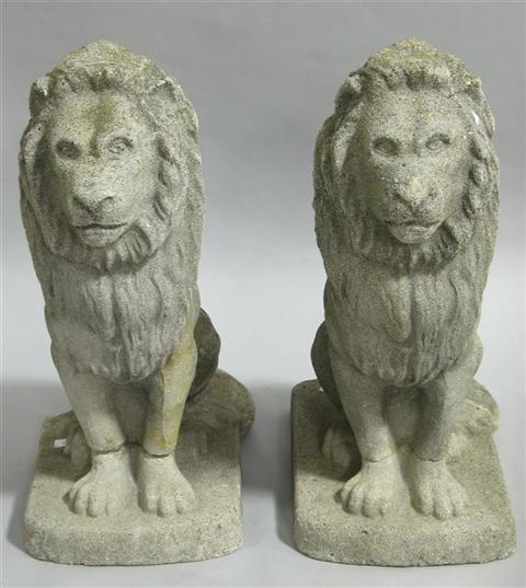 Appraisal: PAIR OF CAST LION ORNAMENTS The proud beasts of a