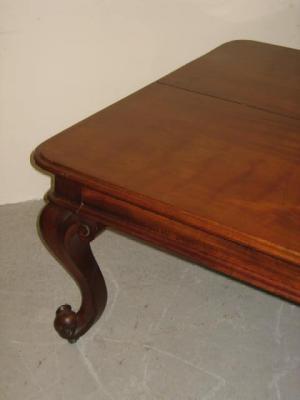 Appraisal: A VICTORIAN MAHOGANY EXTENDING DINING TABLE of rounded oblong form