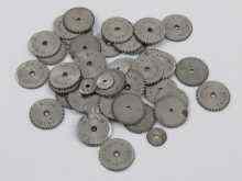 Appraisal: A quantity of steel watch winding wheels each stamped with