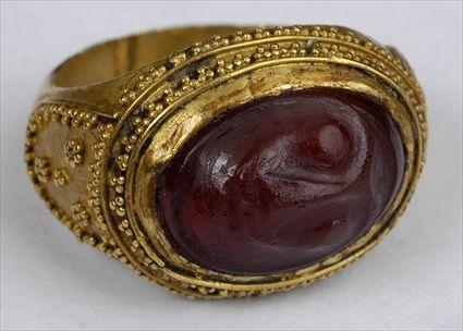 Appraisal: PERSIAN GOLD RING WITH CARNELIAN CARVED CAMEO Size Provenance Property