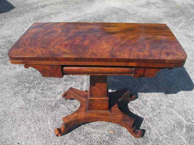 Appraisal: Early th century game table with a flame Mahogany veneer