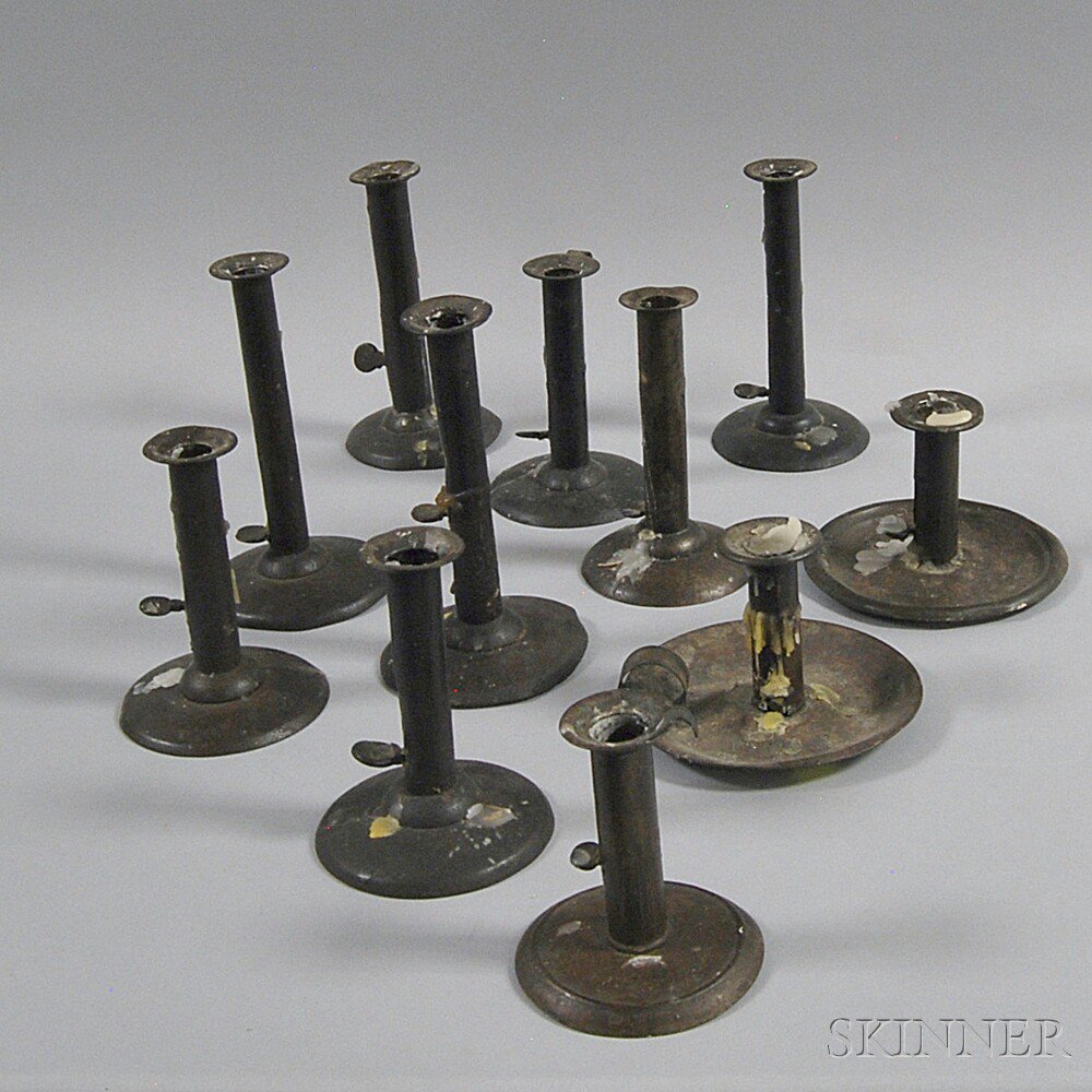 Appraisal: Eleven Tin and Iron Candlesticks th century two chambersticks and