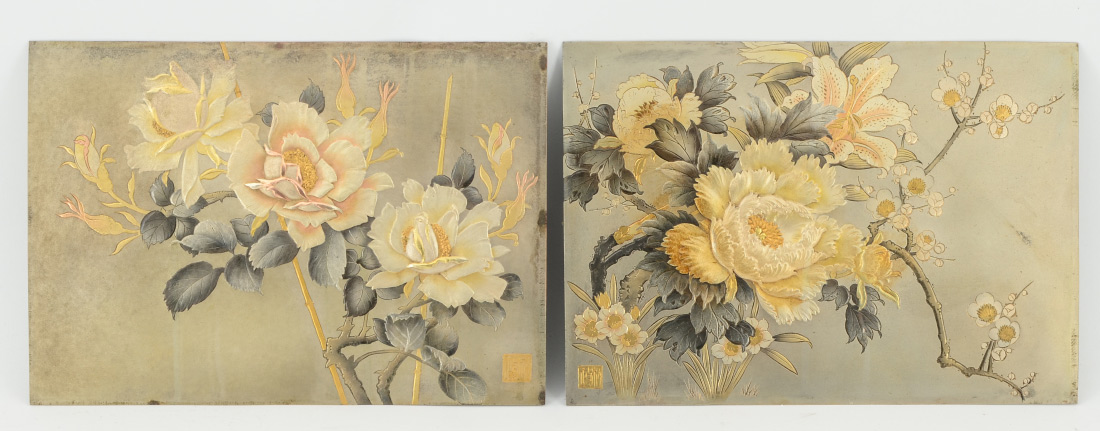 Appraisal: PAIR EMBOSSED JAPANESE MIXED METAL PLAQUES Each with floral design