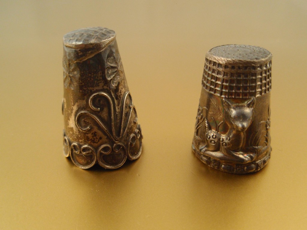 Appraisal: Two silver thimbles