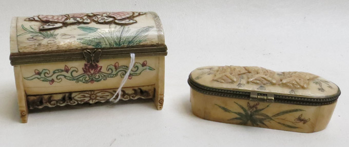 Appraisal: TWO CHINESE SCRIMSHAW BONE BOXES with hinged lids featuring relief