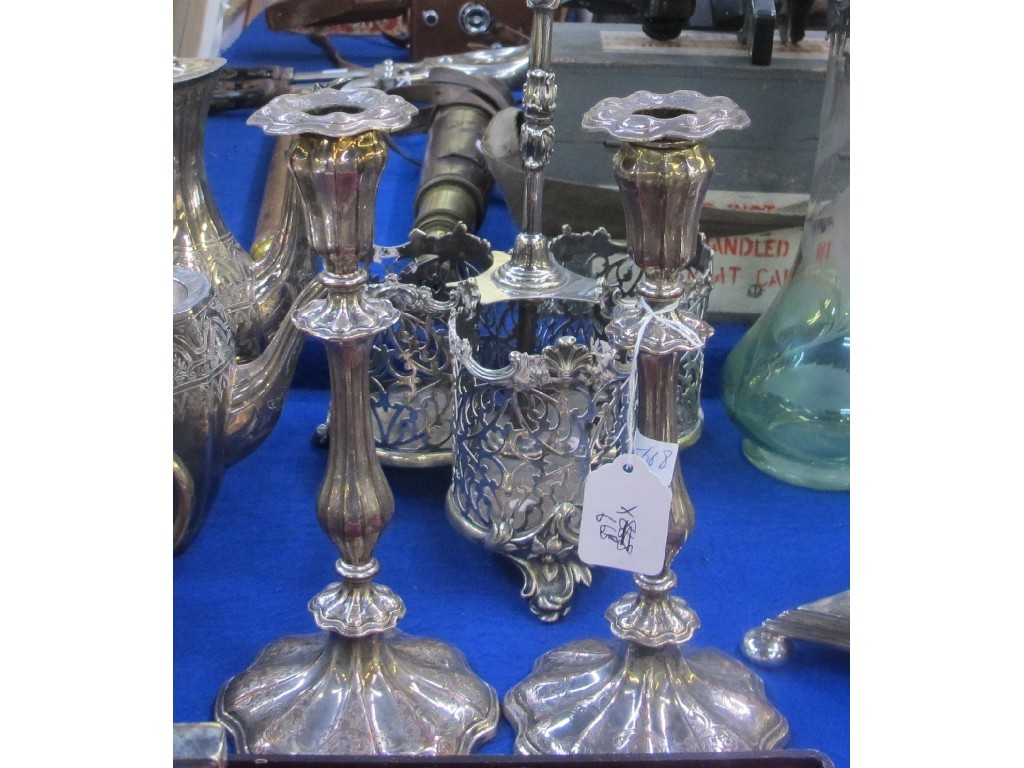 Appraisal: A pair of silver plated candl