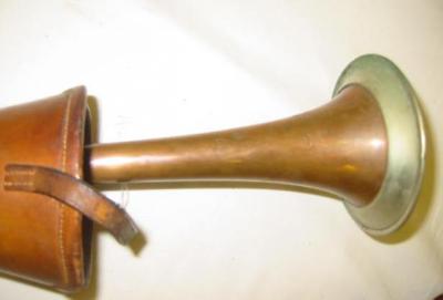 Appraisal: A COPPER AND WHITE METAL COACHING HORN by Kohler Son