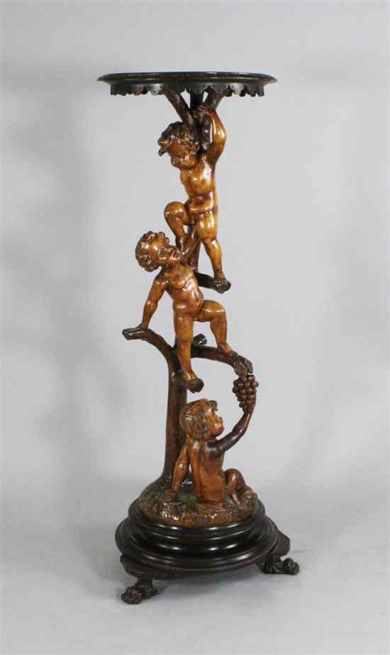 Appraisal: A th century Italian carved and stained pine figural torchere