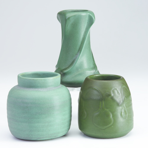 Appraisal: TECO ZANESVILLE Three matte green vases Teco with ribbed body