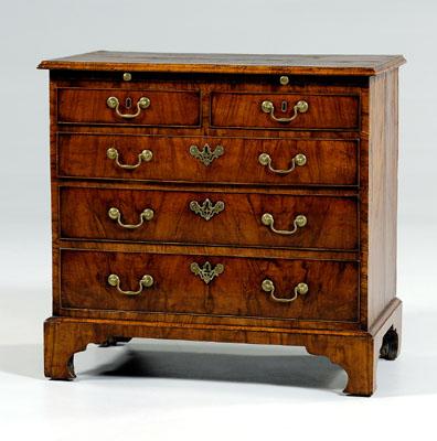 Appraisal: Fine George I bachelor s chest bookmatched walnut veneers pull-out