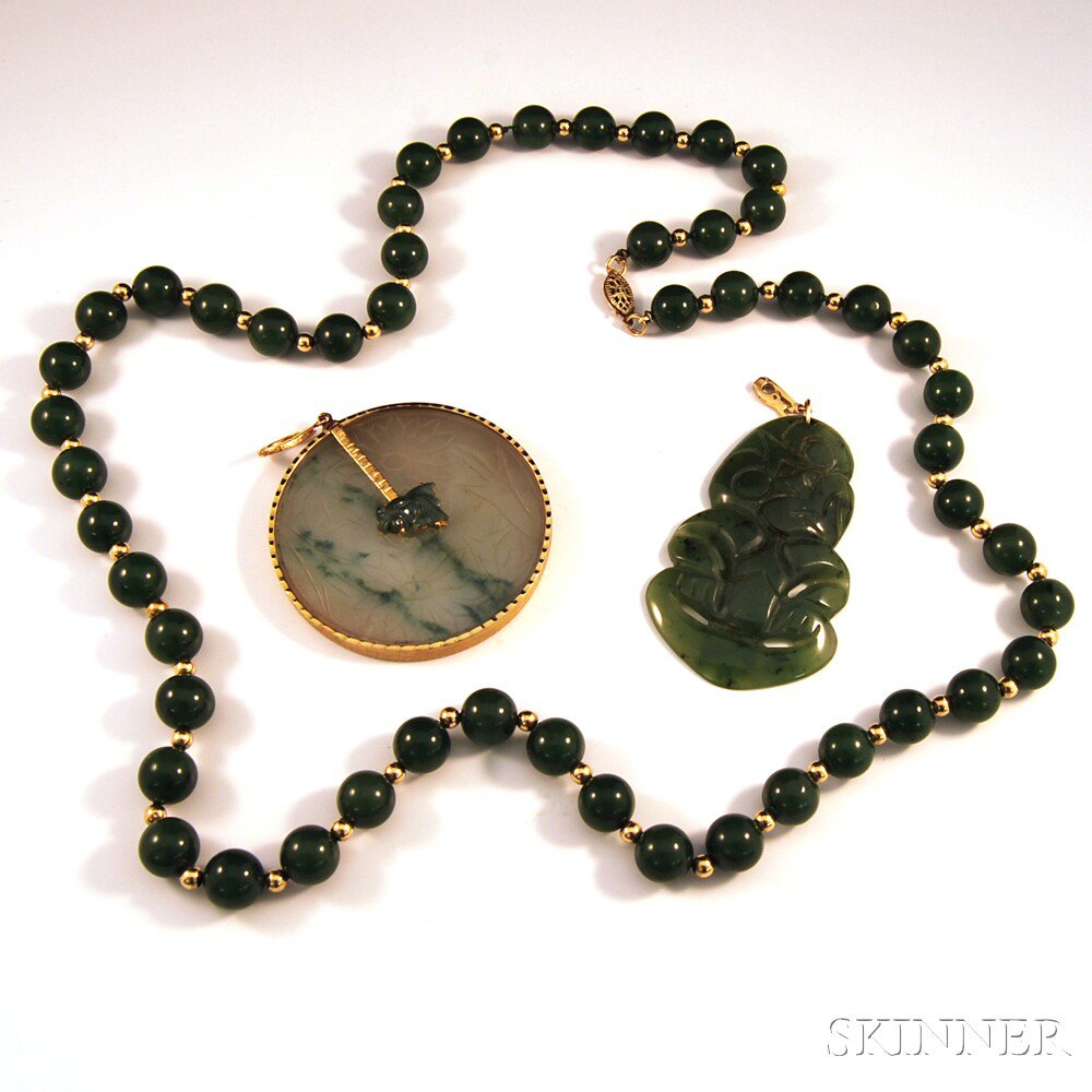 Appraisal: Three Pieces of Nephrite Jade Jewelry a kt gold-mounted circular