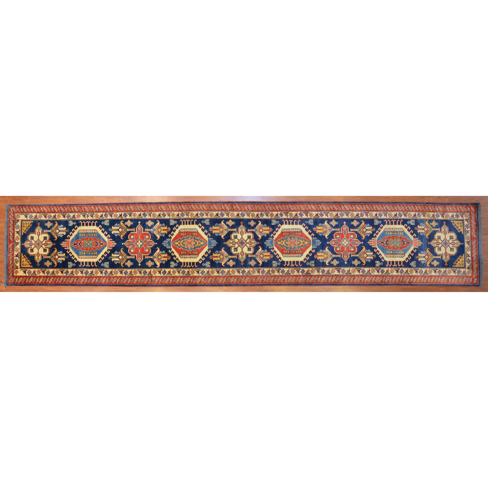 Appraisal: PAK KAZAK RUNNER PAKISTAN X Fourth quarter- th century hand-knotted