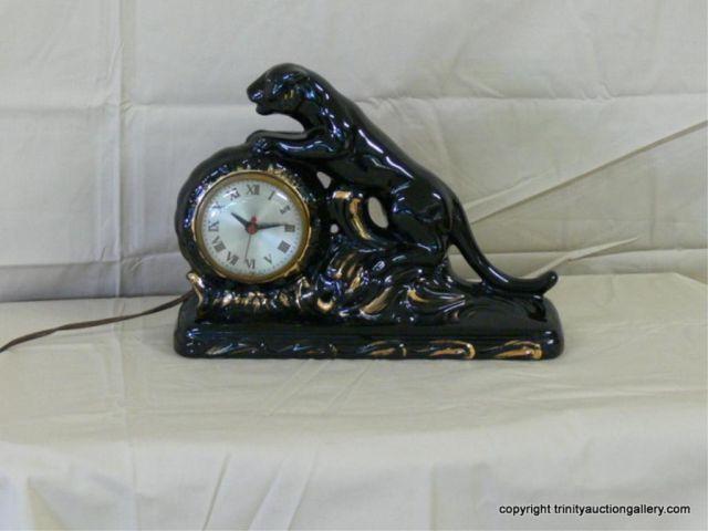 Appraisal: Vintage Ceramic Black Panther Mantle Clock - electric clock works