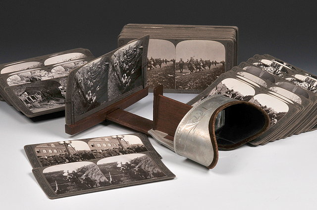 Appraisal: A STEREOSCOPIC VIEWER with a large collection of stereoscopic viewing