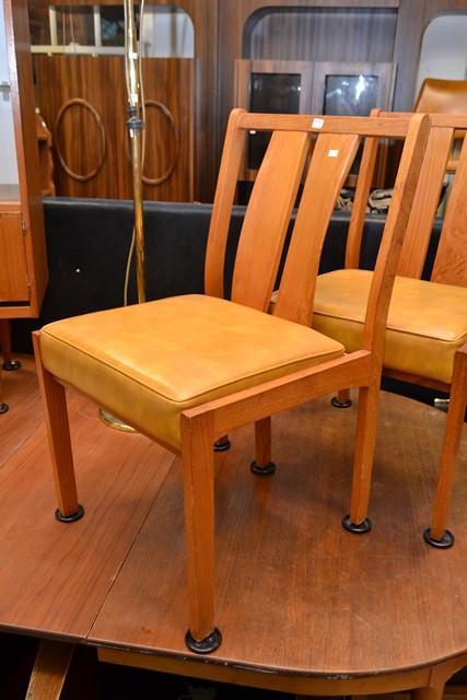 Appraisal: A SET OF FOUR 'S PARKER TEAK AND VINYL CHAIRS