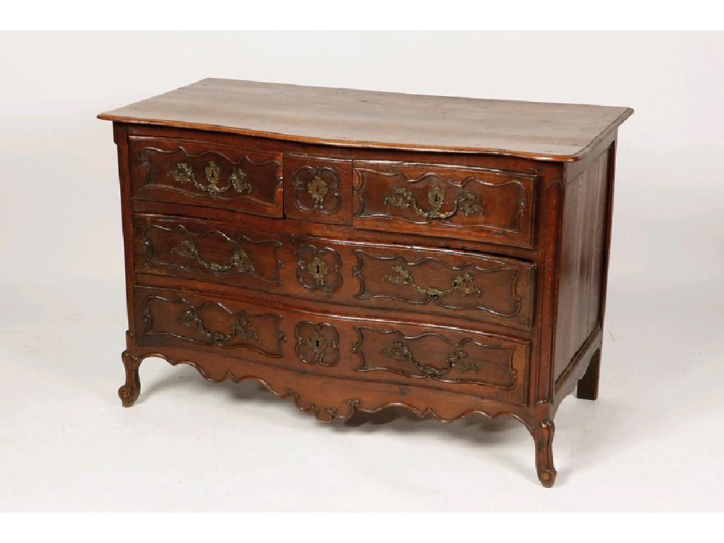 Appraisal: A LOUIS XV OAK SERPENTINE FRONTED COMMODE the shaped top