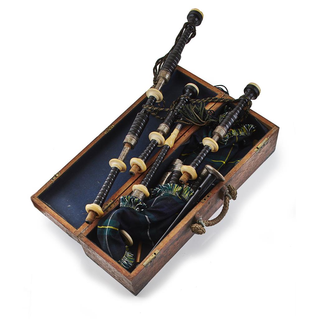 Appraisal: A cased set of bagpipes PH Glasgow ebony ivory and