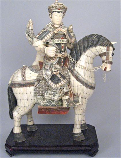 Appraisal: Large pair of Chinese bone horseman models th century Of