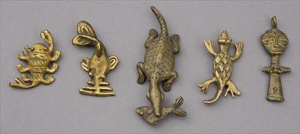 Appraisal: Four Animal-Form Metal Pendents together with a Female-Form Metal Pendent