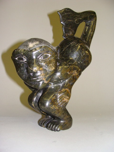 Appraisal: INUIT ARTIST Transformation figure of a Man H in