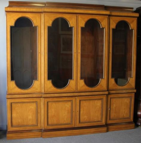 Appraisal: BAKER Impressive Inlaid Satinwood Breakfrontwith Rosewood Banding With glass shelves