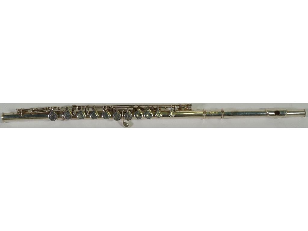 Appraisal: BOOSEY AND HAWKES LONDON 'EMPEROR' ELECTROPLATED THREE PIECE FLUTE with