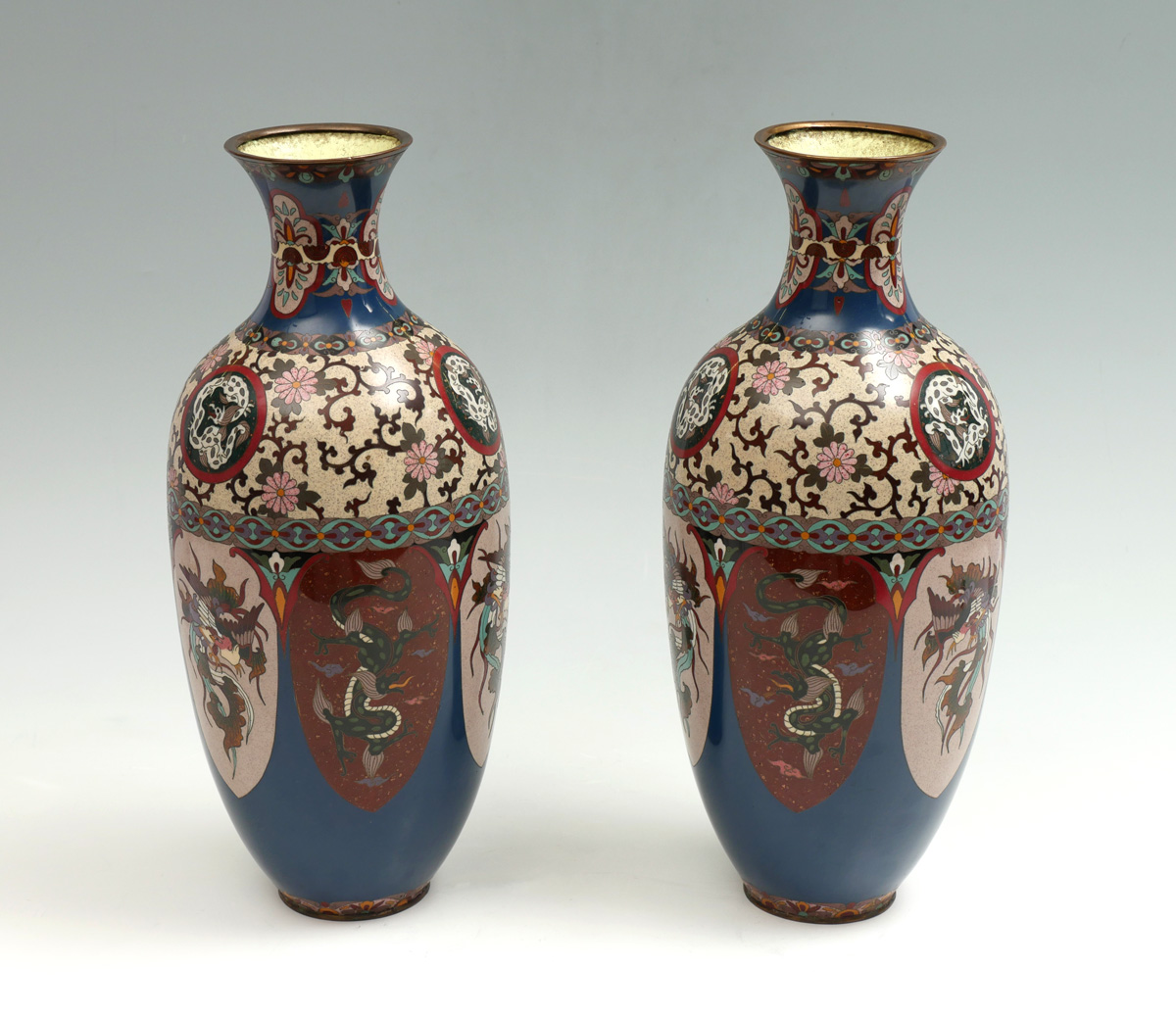 Appraisal: PAIR JAPANESE GINBARI CLOISONNE DRAGON PHOENIX VASE opposing Meiji period