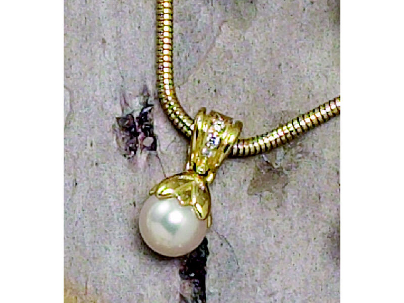 Appraisal: MIKIMOTO PEARL PENDANT k yellow gold pendant with one approximately