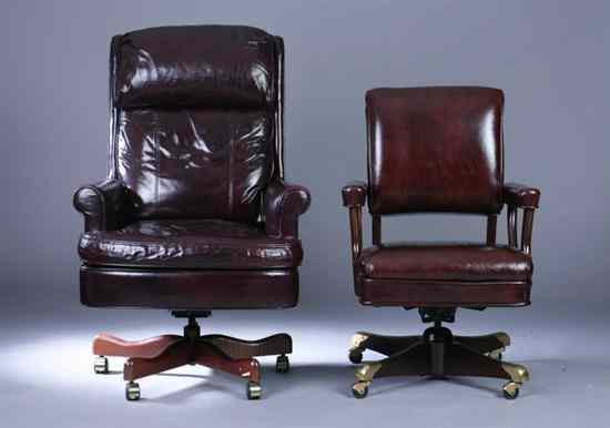 Appraisal: TWO CONTEMPORARY SWIVEL OFFICE CHAIRS ONE LEATHER THE SECOND FAUX