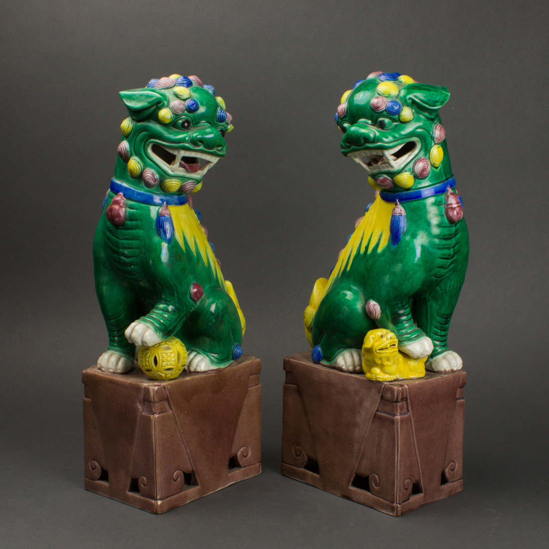 Appraisal: PAIR OF CHINESE FAMILLE VERTE FU LIONS Pair of Chinese