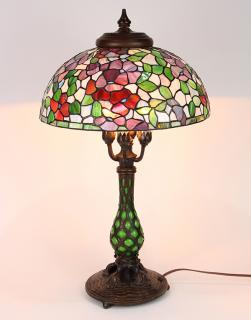 Appraisal: Tiffany style patinated bronze and leaded glass lamp Tiffany style