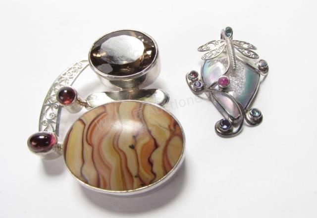 Appraisal: Four sterling pendants including art nouveau four stone pendant with