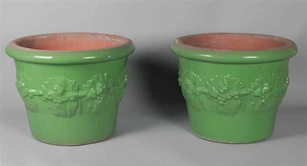 Appraisal: PAIR OF GREEN GARDEN CERAMIC POTS green glazed outside with