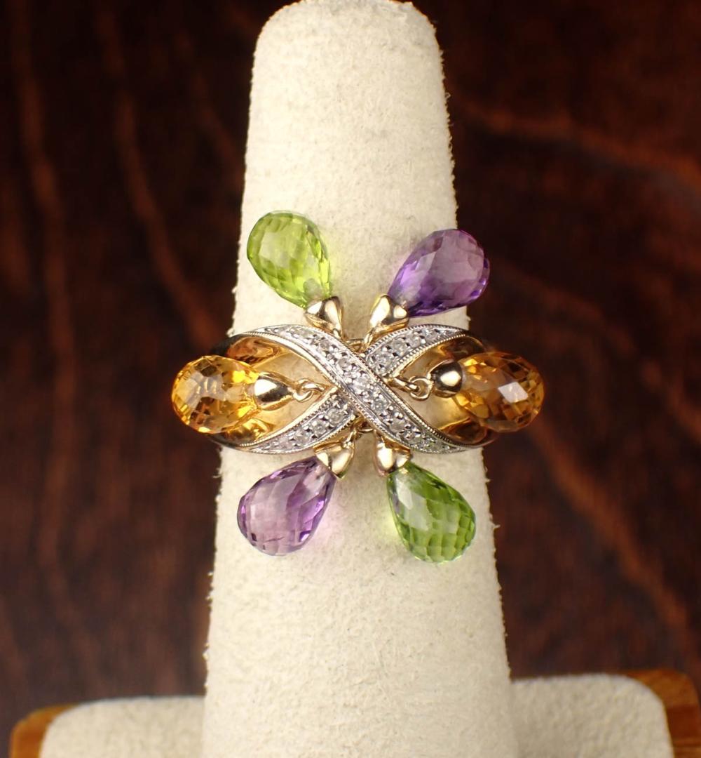 Appraisal: MULTI COLOR GEMSTONE AND FOURTEEN KARAT GOLD RING The yellow