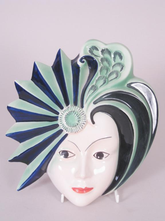 Appraisal: A Crown Devon Face Mask painted by Dorothy Ann