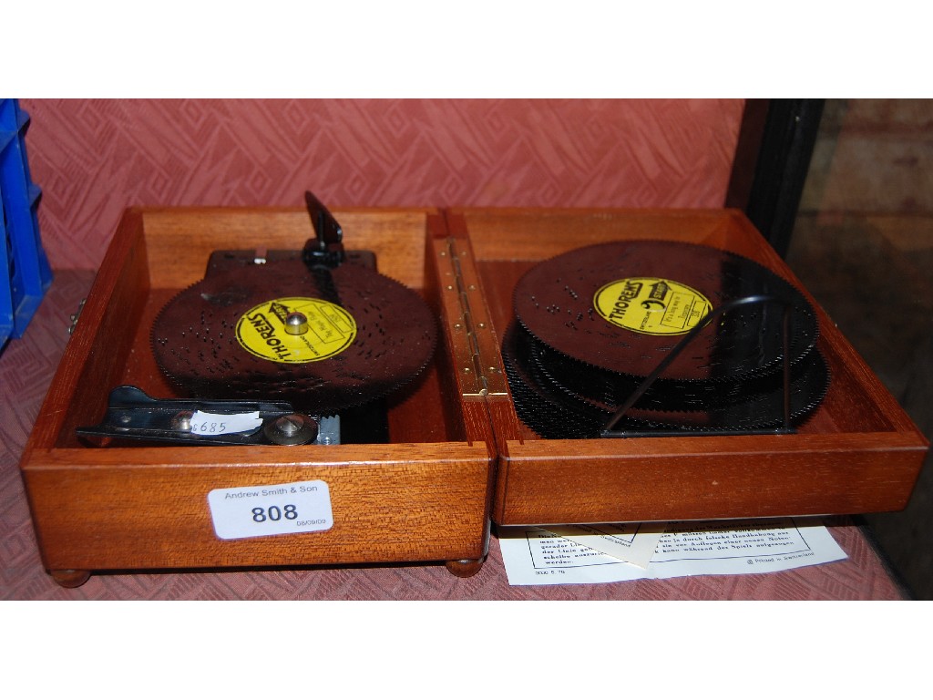 Appraisal: A Swiss Thorens clockwork polyphon music box with metal discs