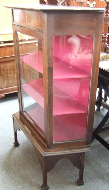 Appraisal: A mid th century display cabinet the upper frieze with