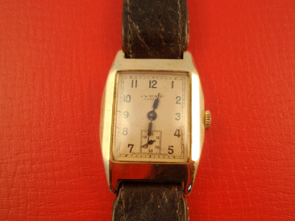 Appraisal: A J W Benson gold cased gentleman's rectangular wristwatch on