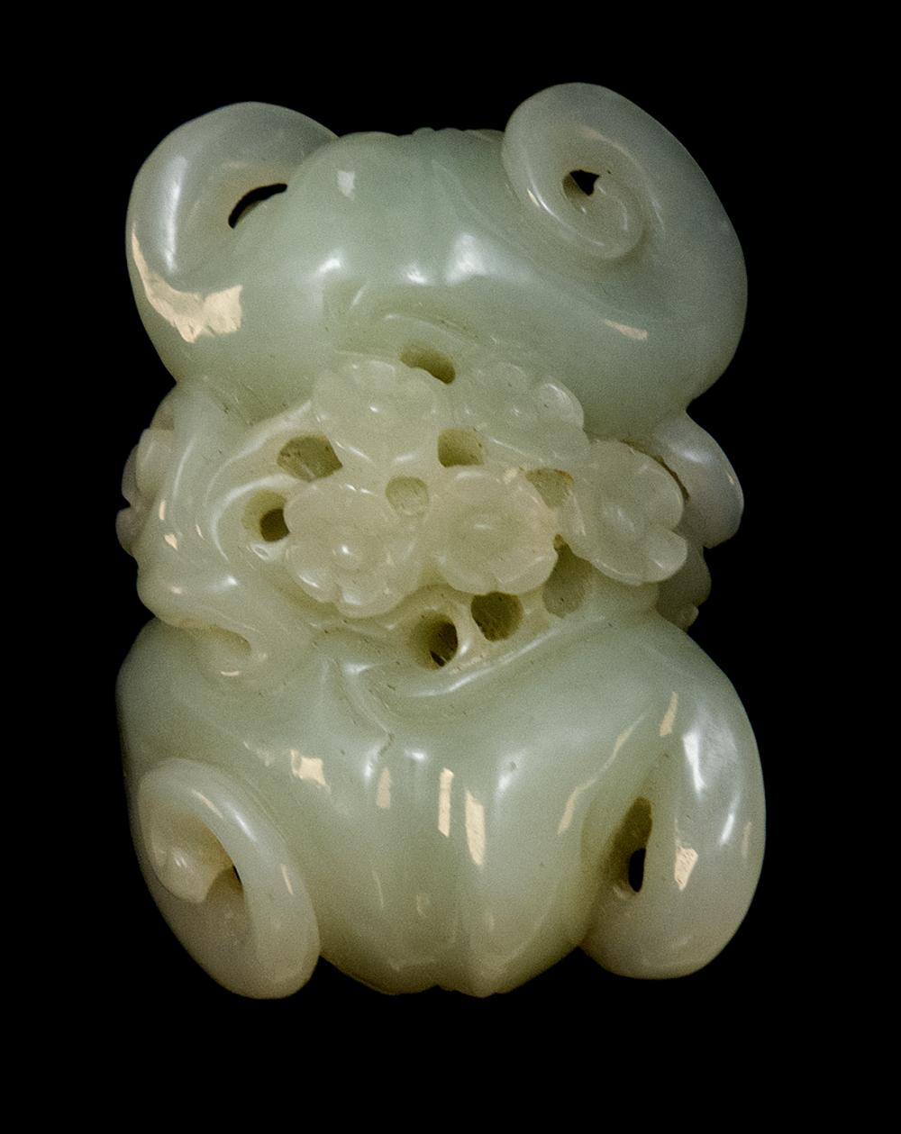 Appraisal: CHINESE CELADON JADE CARVING LENGTH CHINESE CELADON JADE CARVING Lychee