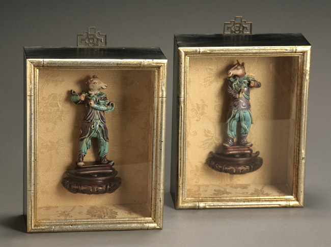 Appraisal: Pair of Chinese Aubergine and Blue Glazed Biscuit 'Zodiac' Figures