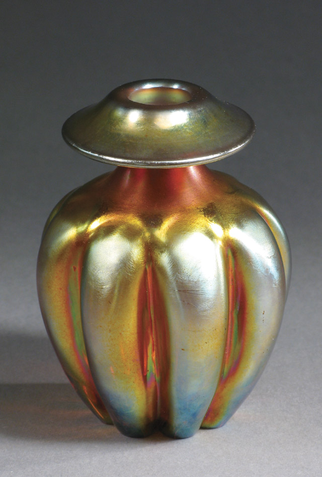 Appraisal: AN UNUSUAL STEUBEN GOLD AURENE BUD VASE having raised paneled