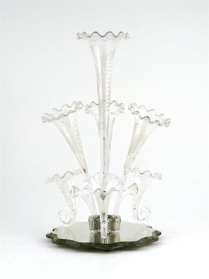 Appraisal: A glass epergne the central upright trumpet between three smaller