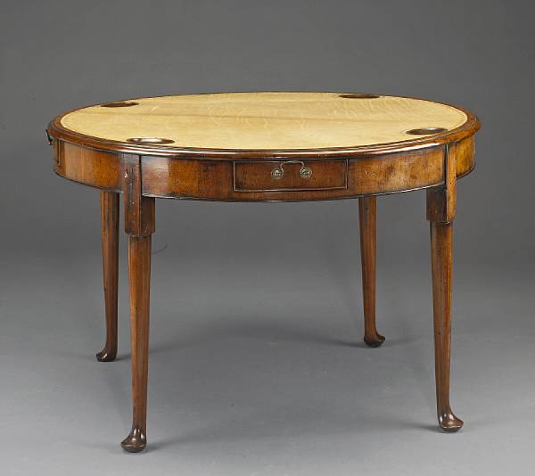 Appraisal: A George II circular walnut games table second quarter th