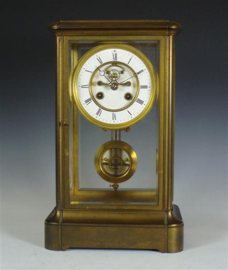 Appraisal: A French four glass brass cased mantel clock the cylinder