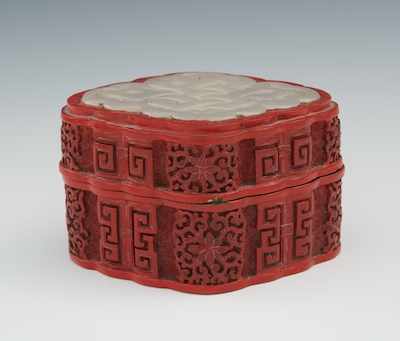 Appraisal: A Chinese Carved Cinnabar Box with Carved White Jade Inset