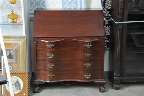 Appraisal: SLANT FRONT DESK Mahogany with a shell carved interior door