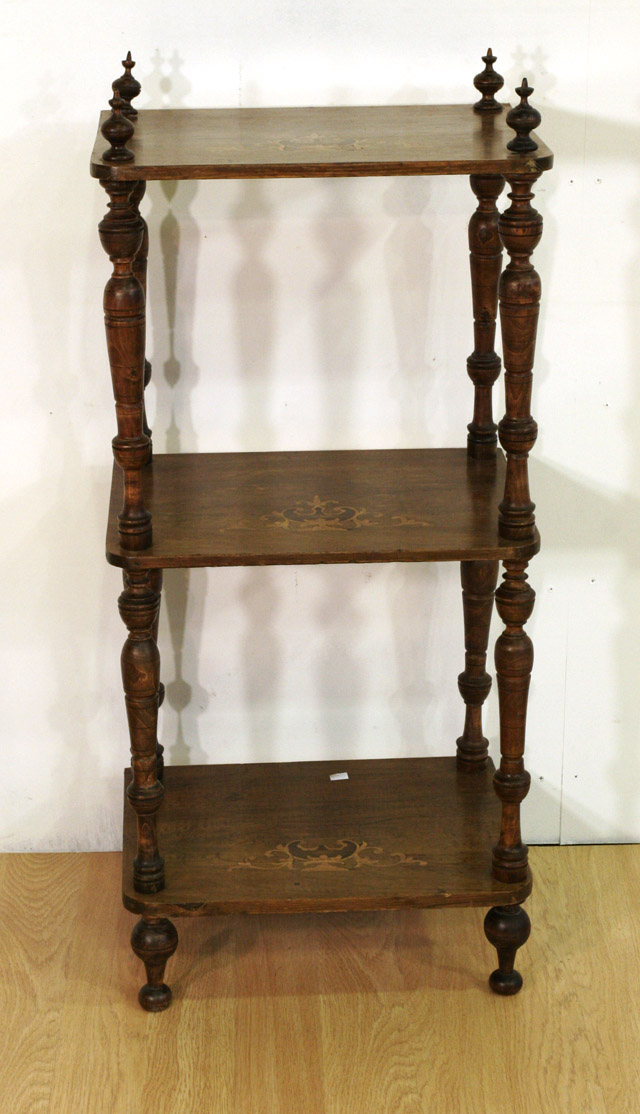 Appraisal: An Edwardian three tiered mahogany and marquetry inlaid whatnot